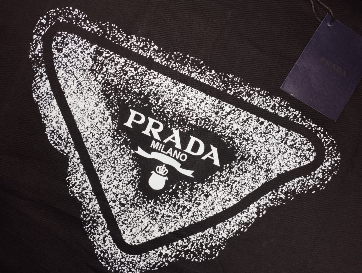 Prada triángulo
